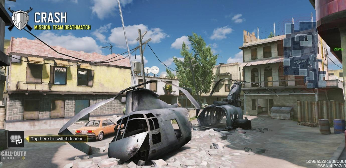 Tampilan map Crash di Call of Duty Mobile dengan posisi helikopter jatuh di tengah dan bangunan bertingkat di sekitarnya, digunakan sebagai panduan strategi dan posisi callout